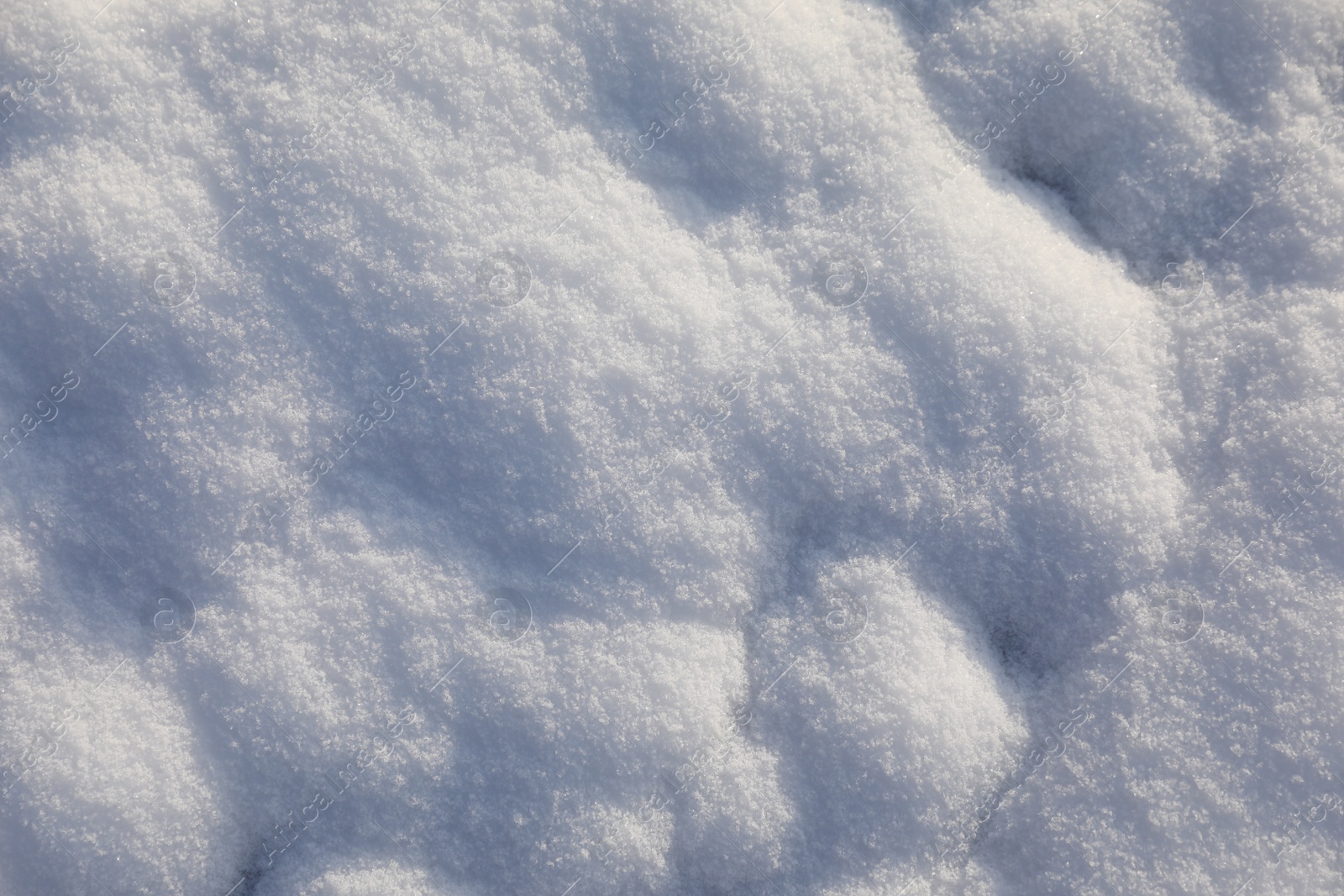 Photo of Beautiful white snow as background, closeup view