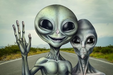 Aliens on asphalt highway outdoors. Extraterrestrial visitors