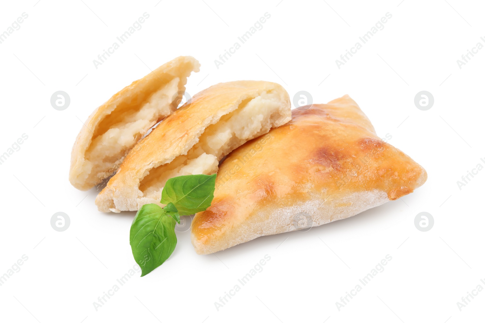 Photo of Delicious samosas and basil isolated on white. Homemade pastry