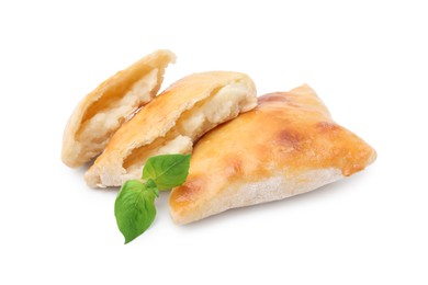 Photo of Delicious samosas and basil isolated on white. Homemade pastry