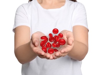 Young woman and illustration of red blood cells on white background. Donation concept