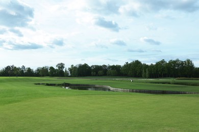 Photo of Beautiful view of golf course on sunny day