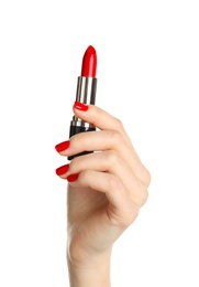 Woman holding lipstick on white background, closeup