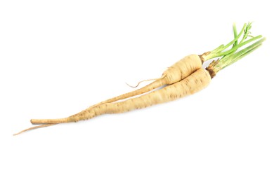 Tasty fresh ripe parsnips on white background