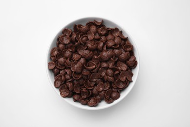 Breakfast cereal. Chocolate corn flakes in bowl on white table, top view