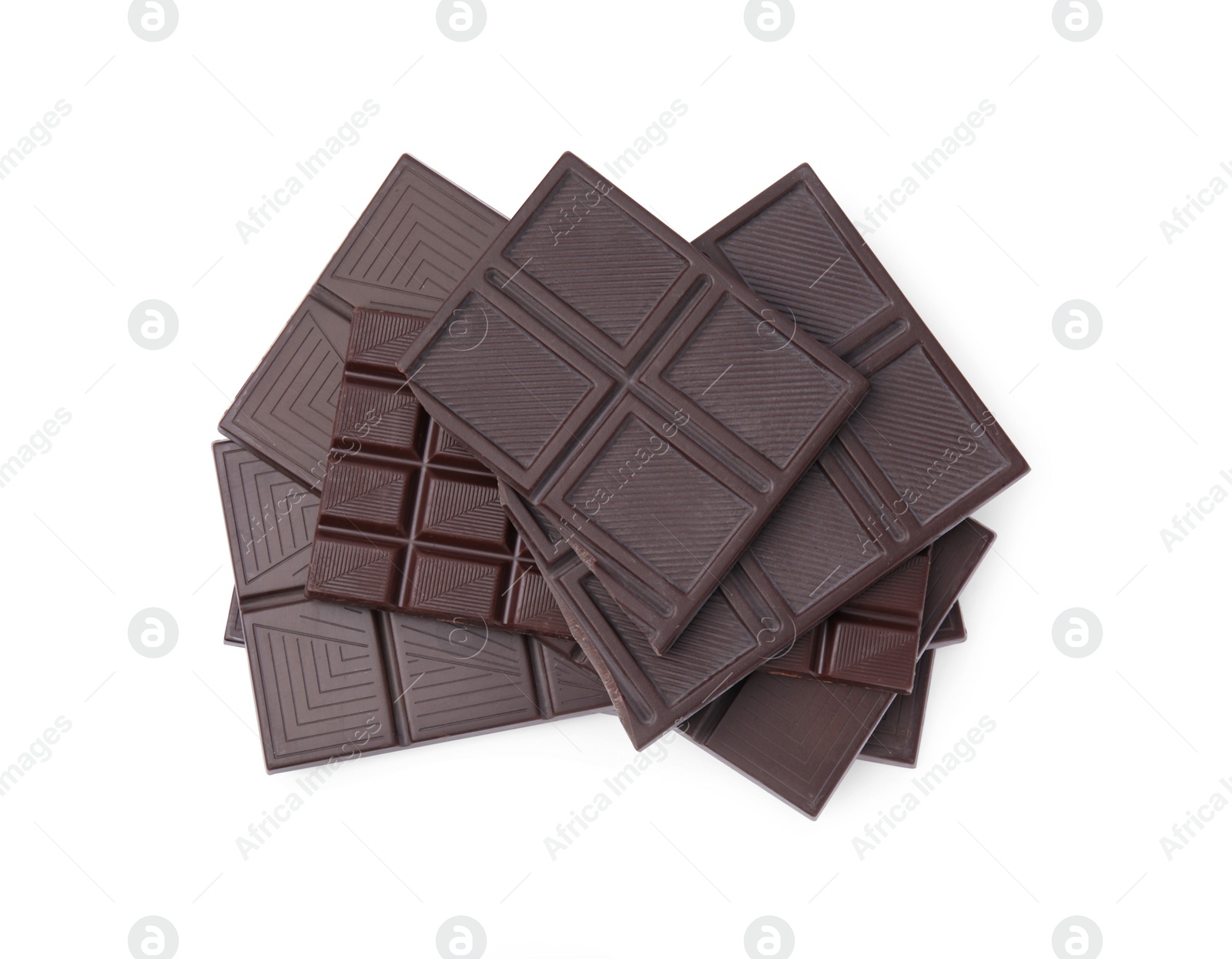 Photo of Pieces of delicious dark chocolate bars isolated on white, top view