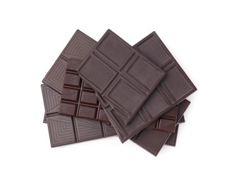 Photo of Pieces of delicious dark chocolate bars isolated on white, top view