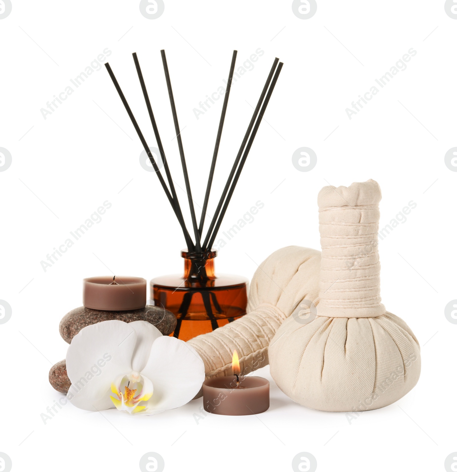 Photo of Beautiful spa composition with burning candle and different care products on white background