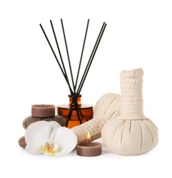Photo of Beautiful spa composition with burning candle and different care products on white background