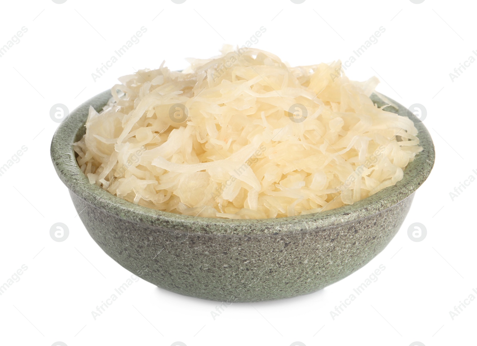 Photo of Bowl of tasty fermented cabbage isolated on white