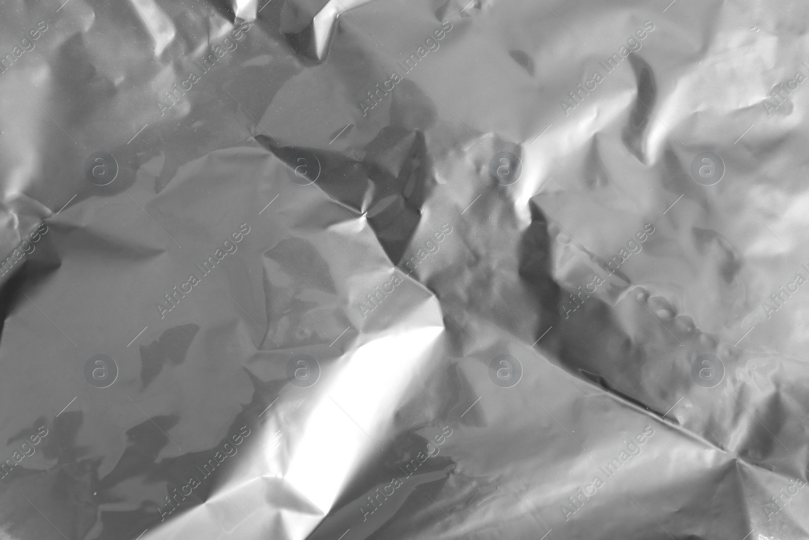 Image of Crumpled silver foil as background, closeup view