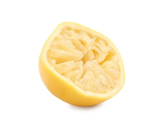 Photo of Half of squeezed lemon isolated on white