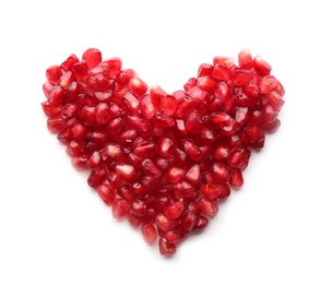 Photo of Heart made of pomegranate seeds on white background, top view