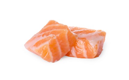 Photo of Pieces of fresh raw salmon on white background