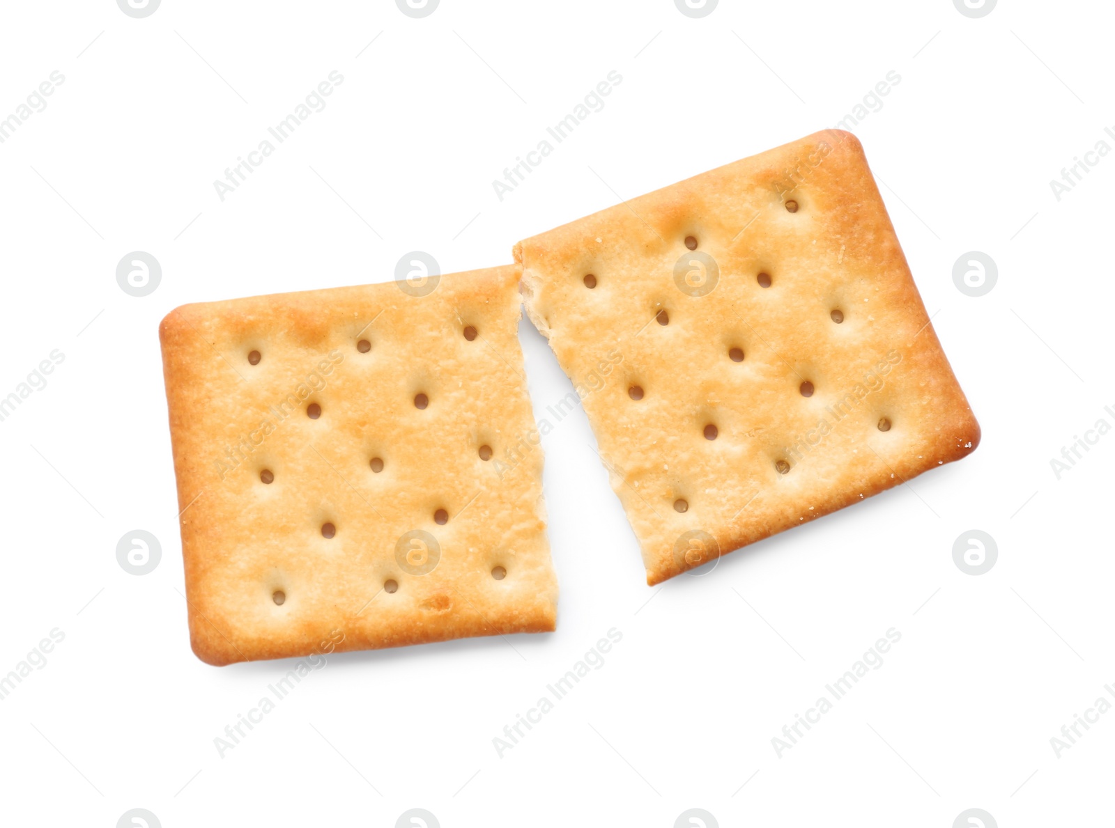 Photo of Broken delicious crispy cracker isolated on white, top view