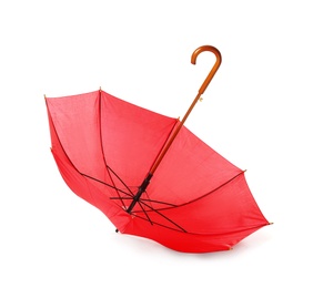 Photo of Modern opened red umbrella isolated on white