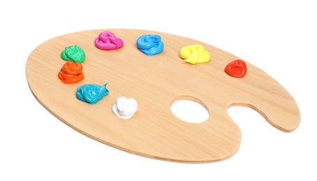 Photo of Palette with paints on white background. Artist equipment