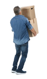 Photo of Mature man carrying carton boxes on white background. Posture concept