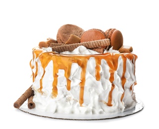 Photo of Delicious homemade cake with caramel sauce and cookies on white background