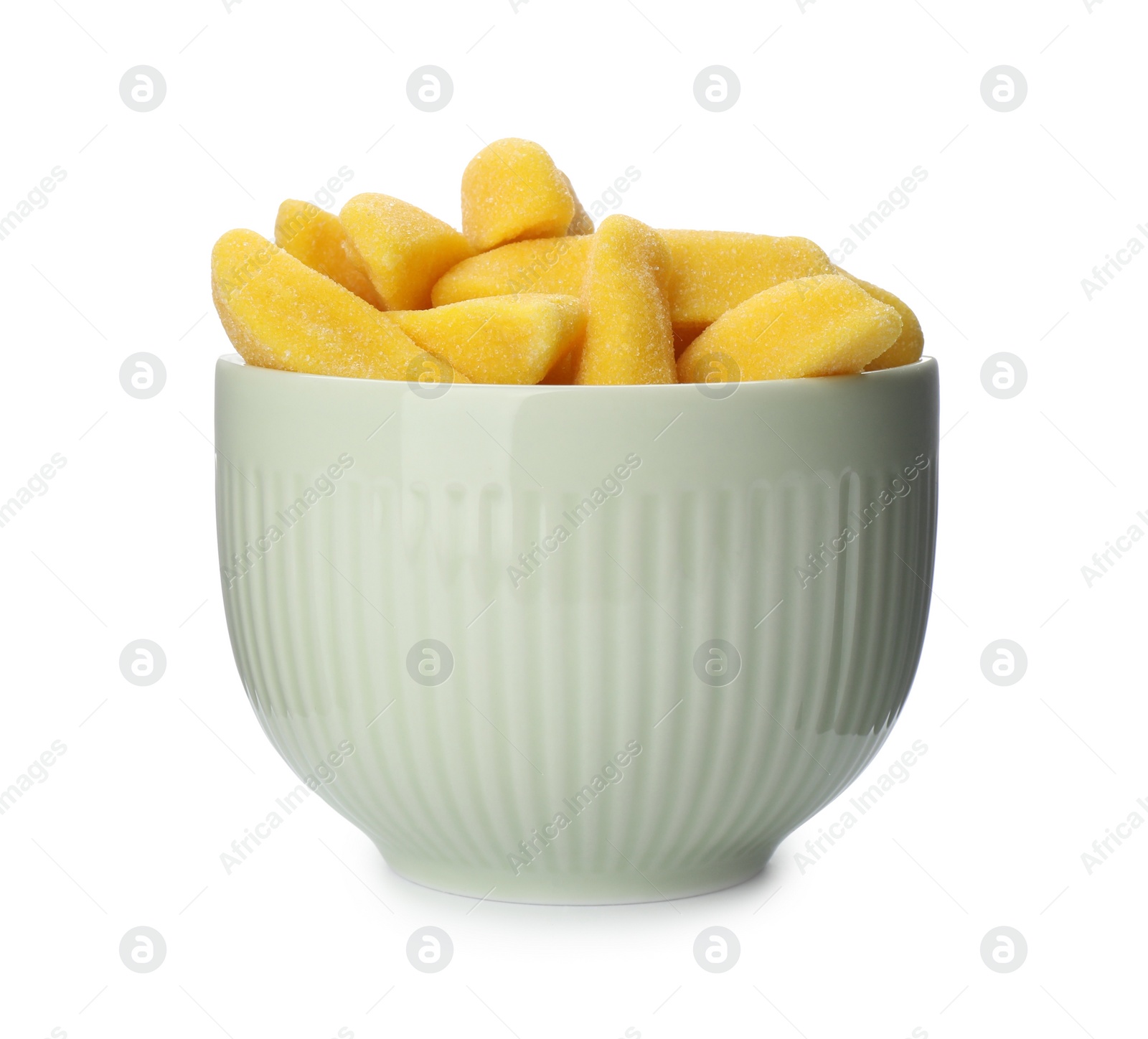 Photo of Bowl with jelly candies in shape of banana on white background