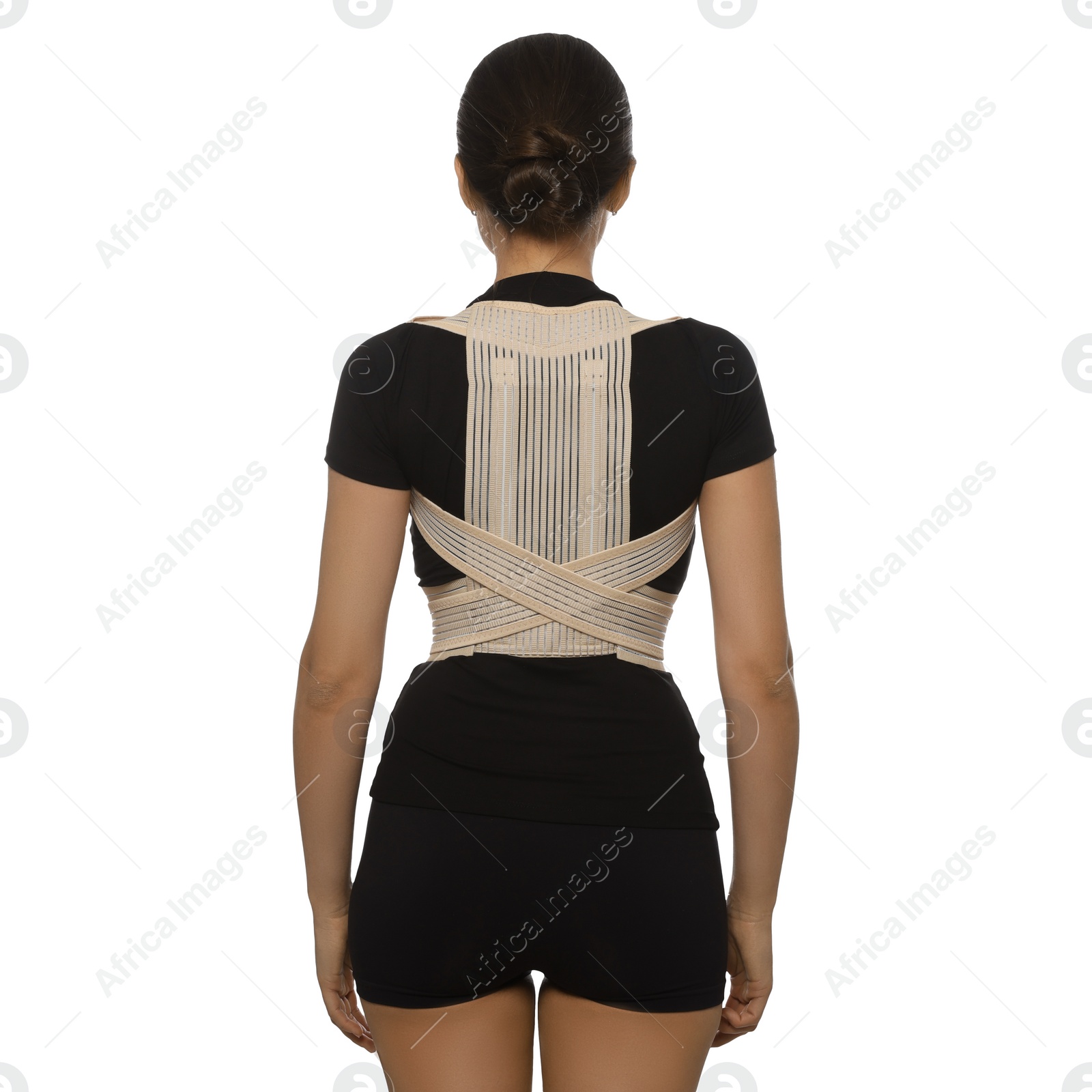 Photo of Woman with orthopedic corset on white background, back view