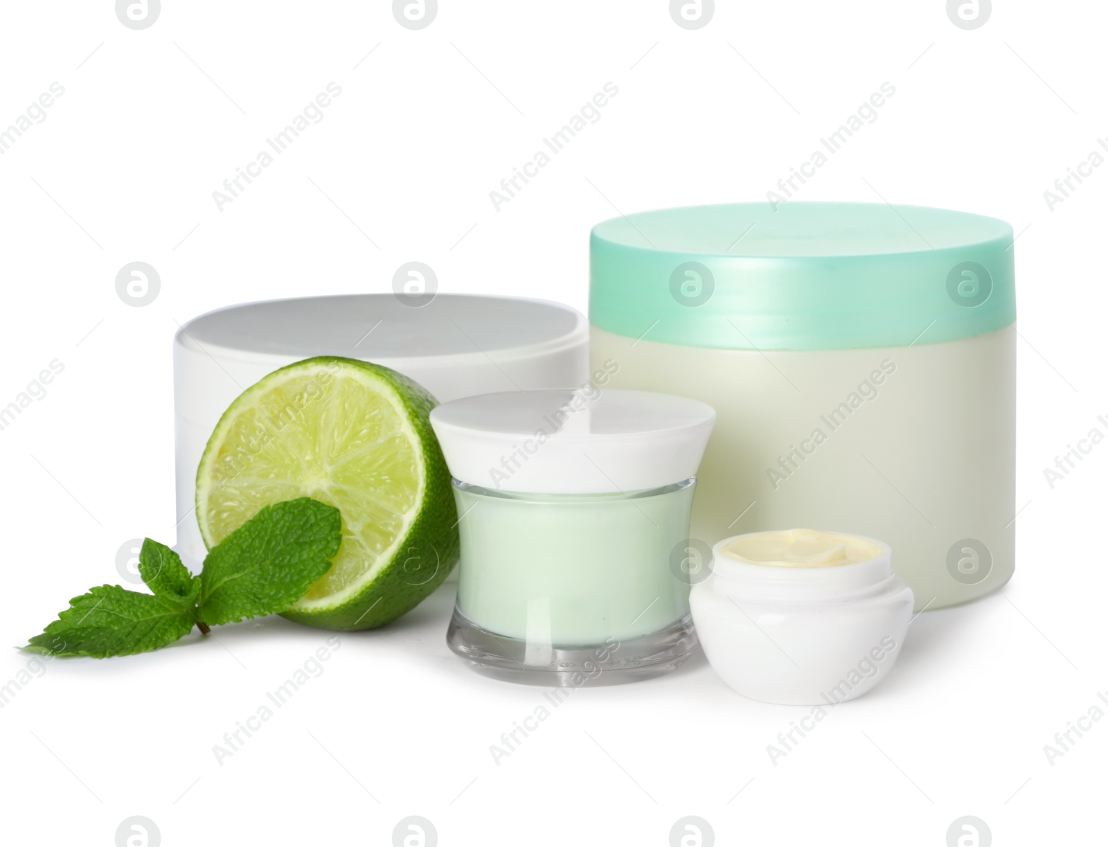 Photo of Jars with cream on white background. Hand care cosmetics