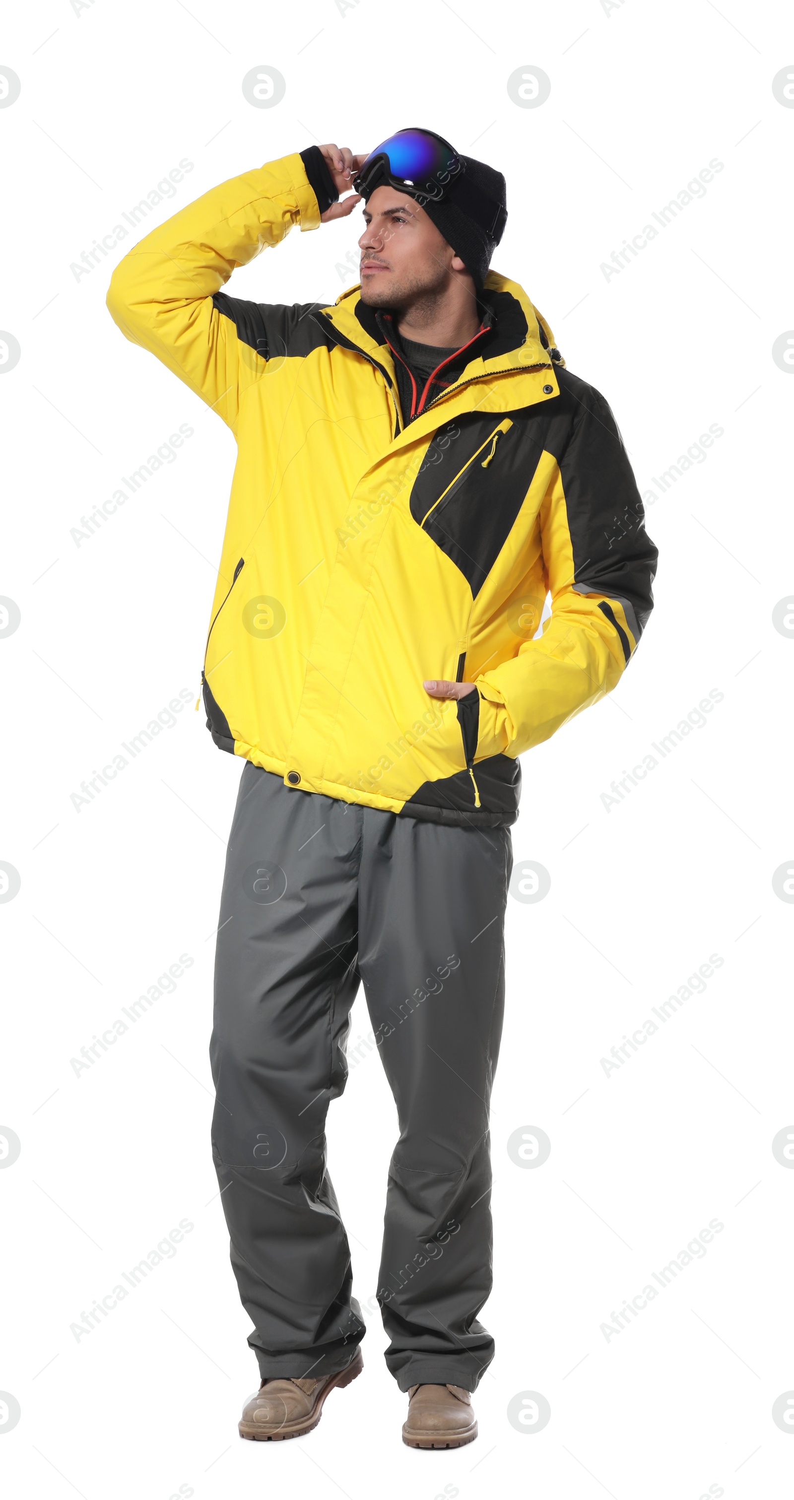 Photo of Man wearing stylish winter sport clothes on white background