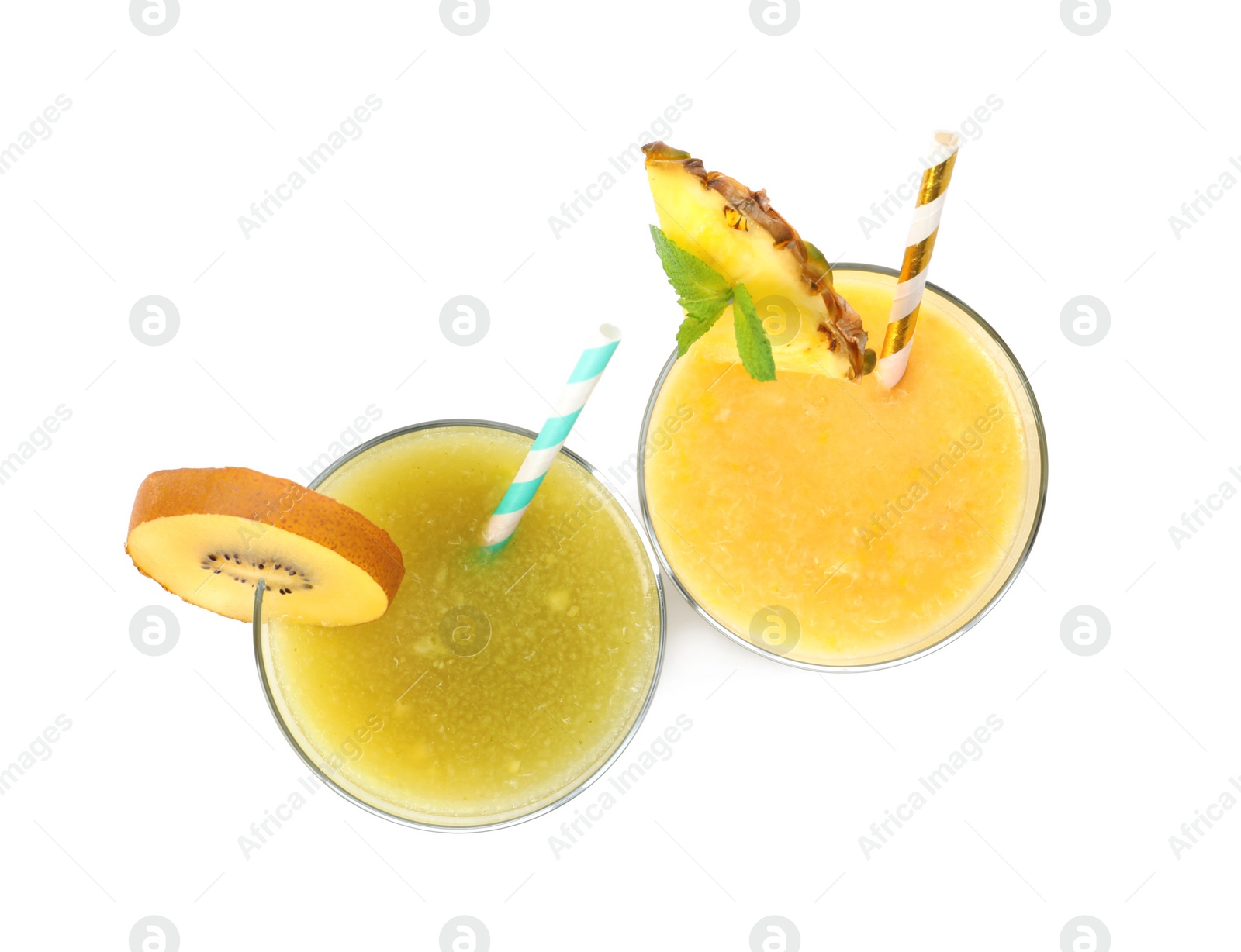 Photo of Delicious colorful juices in glasses isolated on white, top view