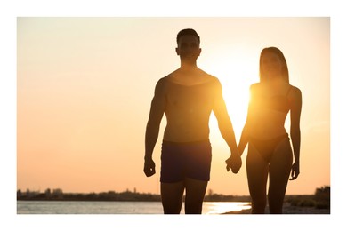 Paper photo. Lovely couple on beach at sunset 