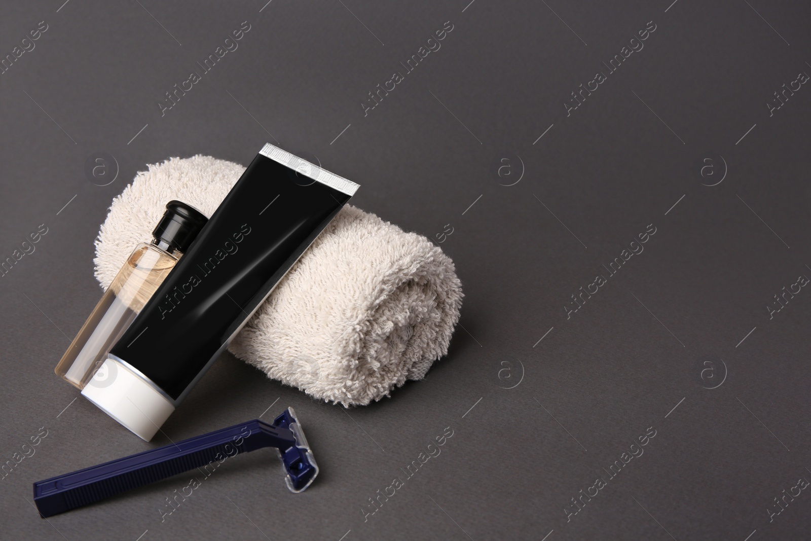 Photo of Different men's shaving accessories on grey background, space for text