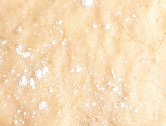 Fresh raw dough as background