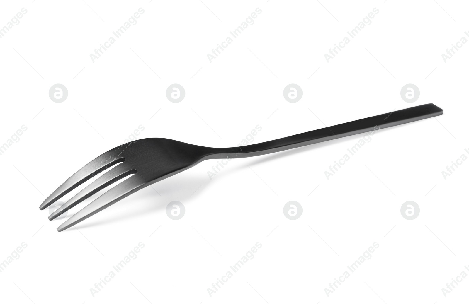 Photo of Clean shiny metal fork isolated on white