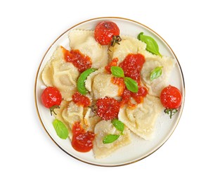 Tasty ravioli with tomato sauce isolated on white, top view