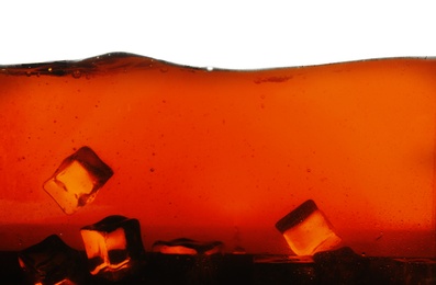 Closeup view of tasty refreshing cola with ice cubes on white background