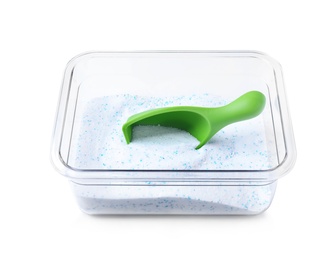 Photo of Plastic container with laundry powder and measuring scoop isolated on white