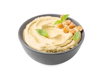 Bowl of delicious hummus with chickpeas isolated on white