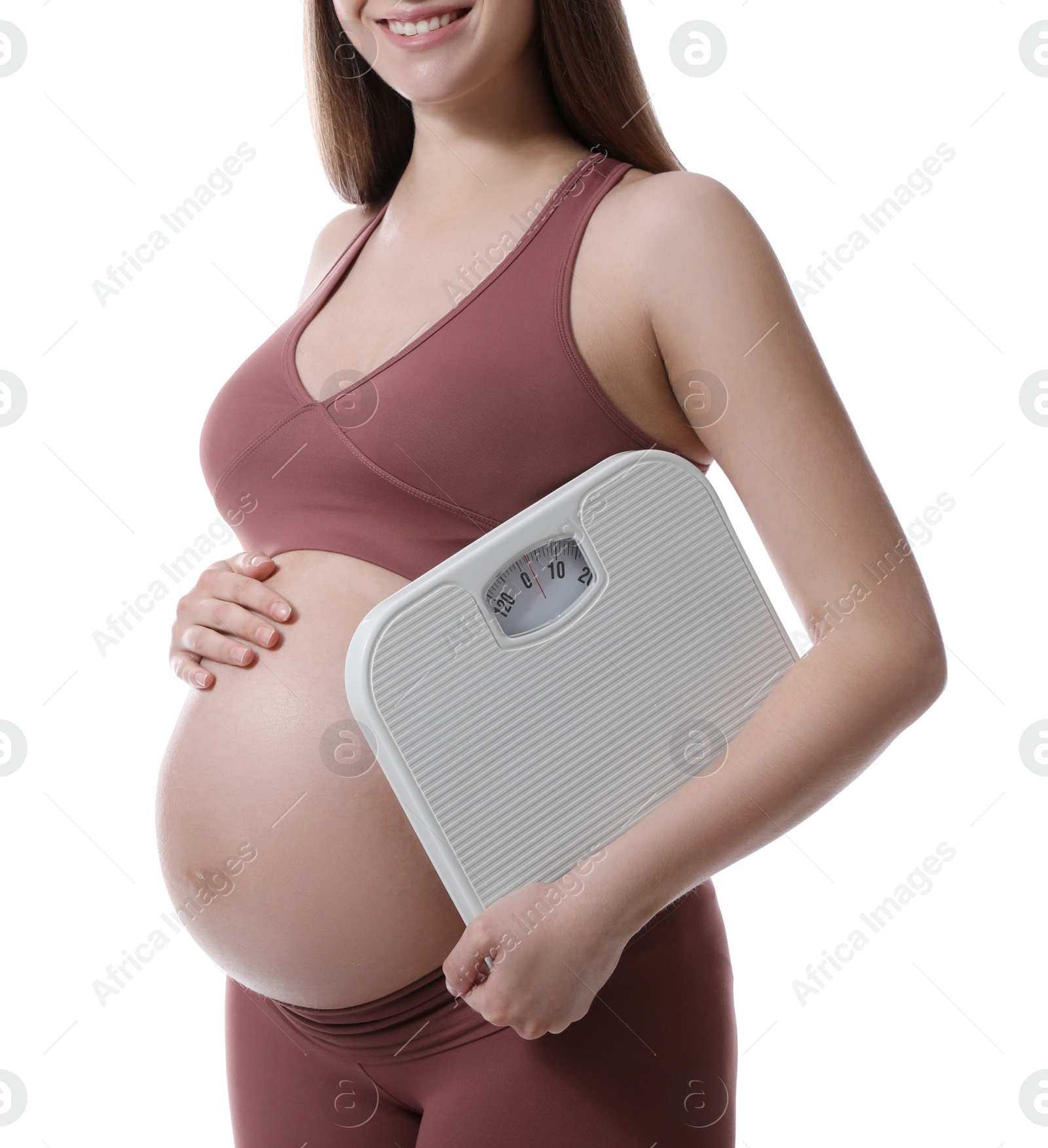 Photo of Pregnant woman with scales on white background, closeup