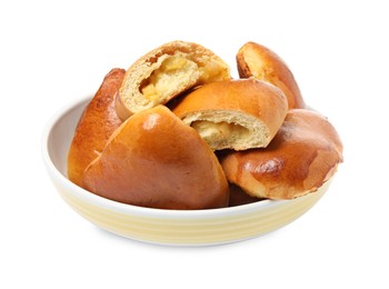 Photo of Delicious baked apple pirozhki in bowl on white background