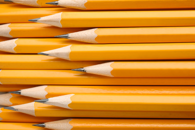 Photo of Many graphite pencils as background, top view