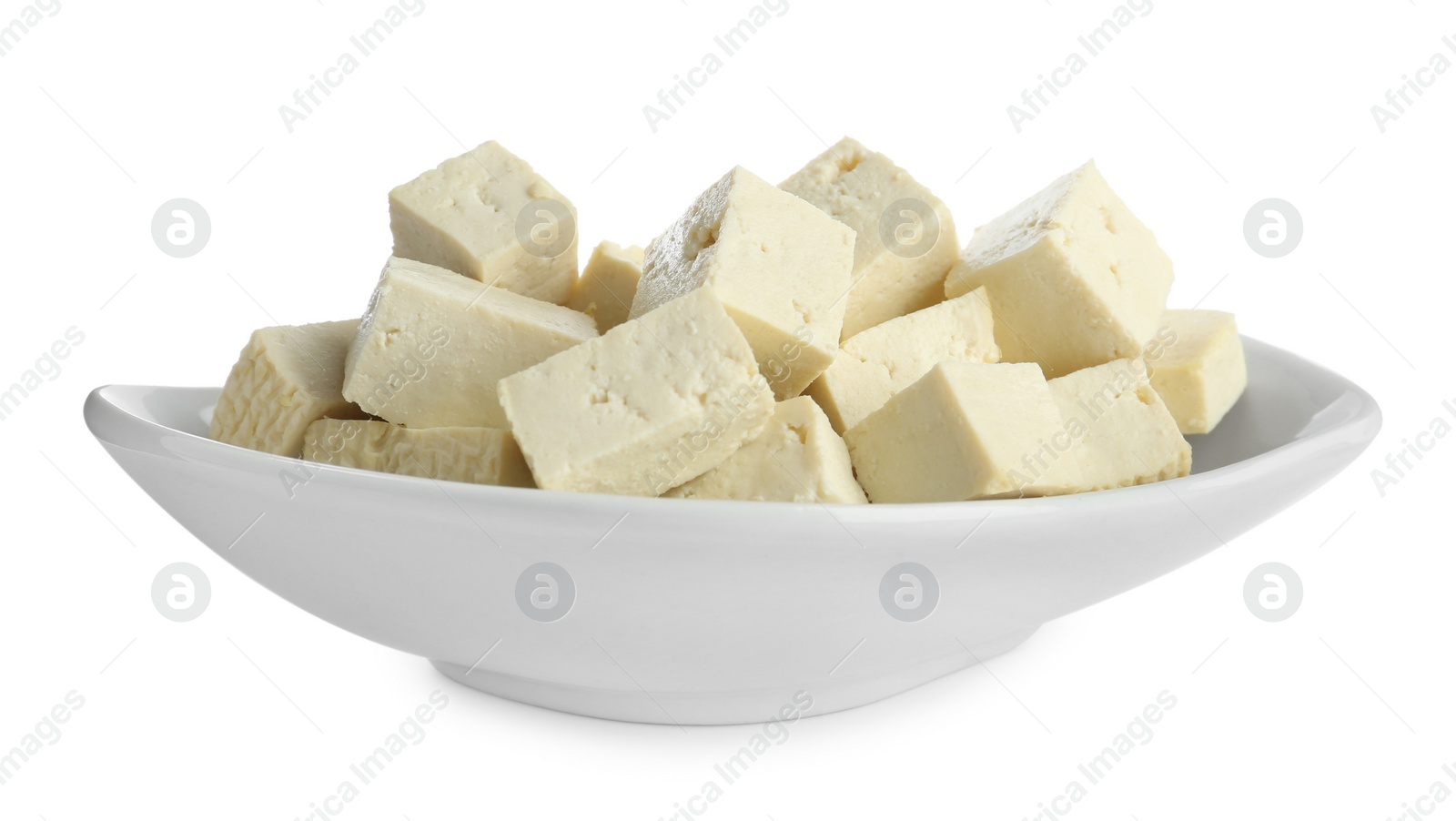 Photo of Pieces of delicious tofu on white background. Soybean curd
