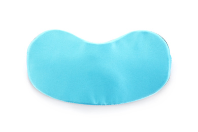 Photo of Turquoise sleeping eye mask isolated on white, top view. Bedtime