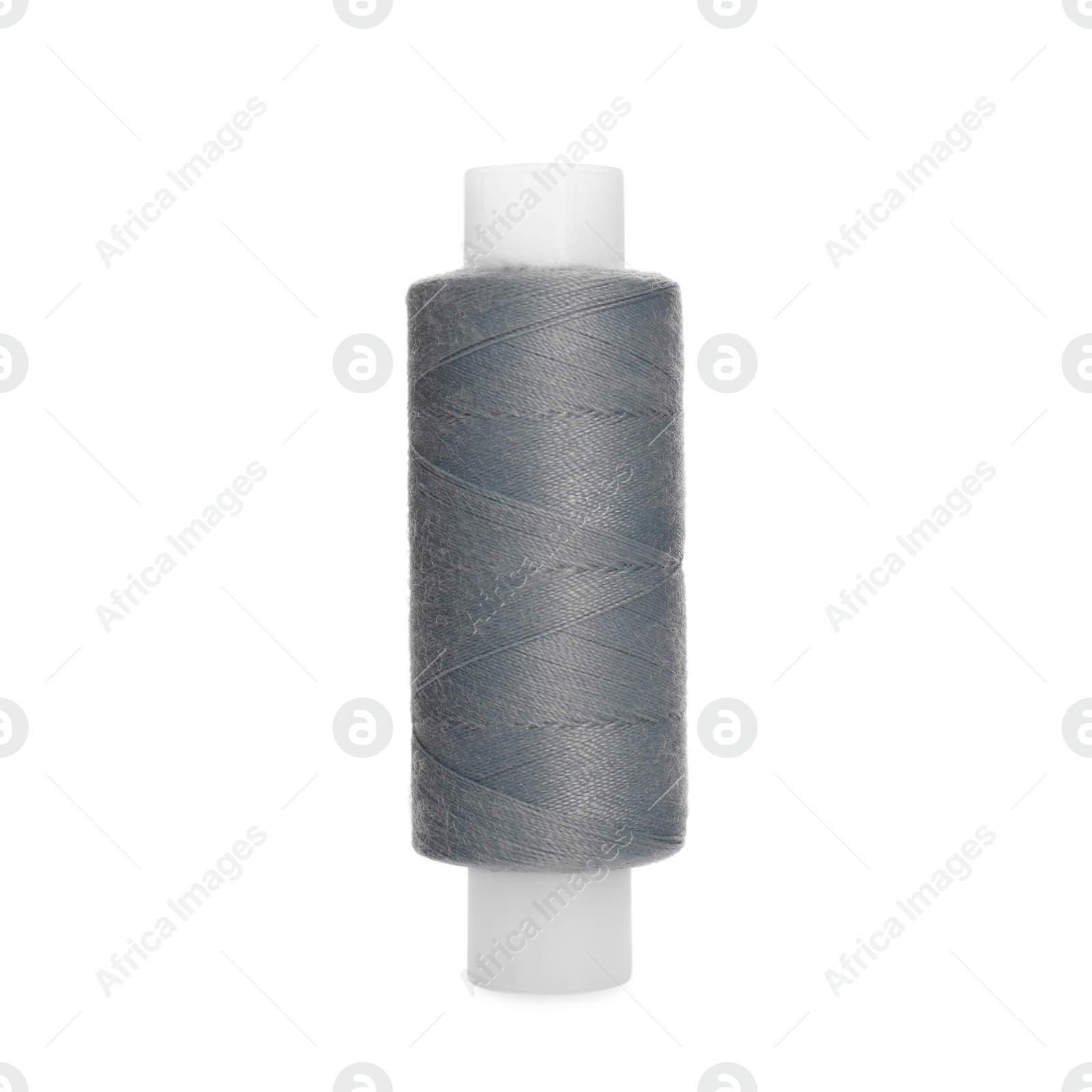 Photo of Spool of grey sewing thread isolated on white