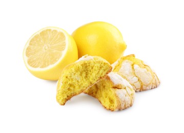 Photo of Tasty homemade lemon cookies and fresh fruits on white background