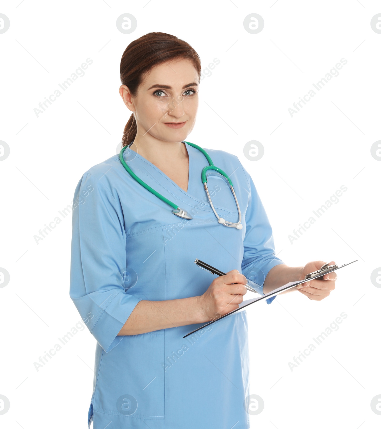 Photo of Portrait of female doctor in scrubs with clipboard isolated on white. Medical staff