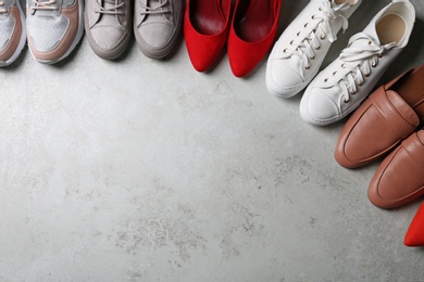 Photo of Flat lay composition with stylish shoes and space for text on grey background