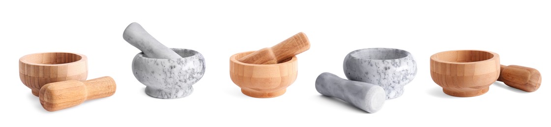 Set of wooden and stone mortars on white background