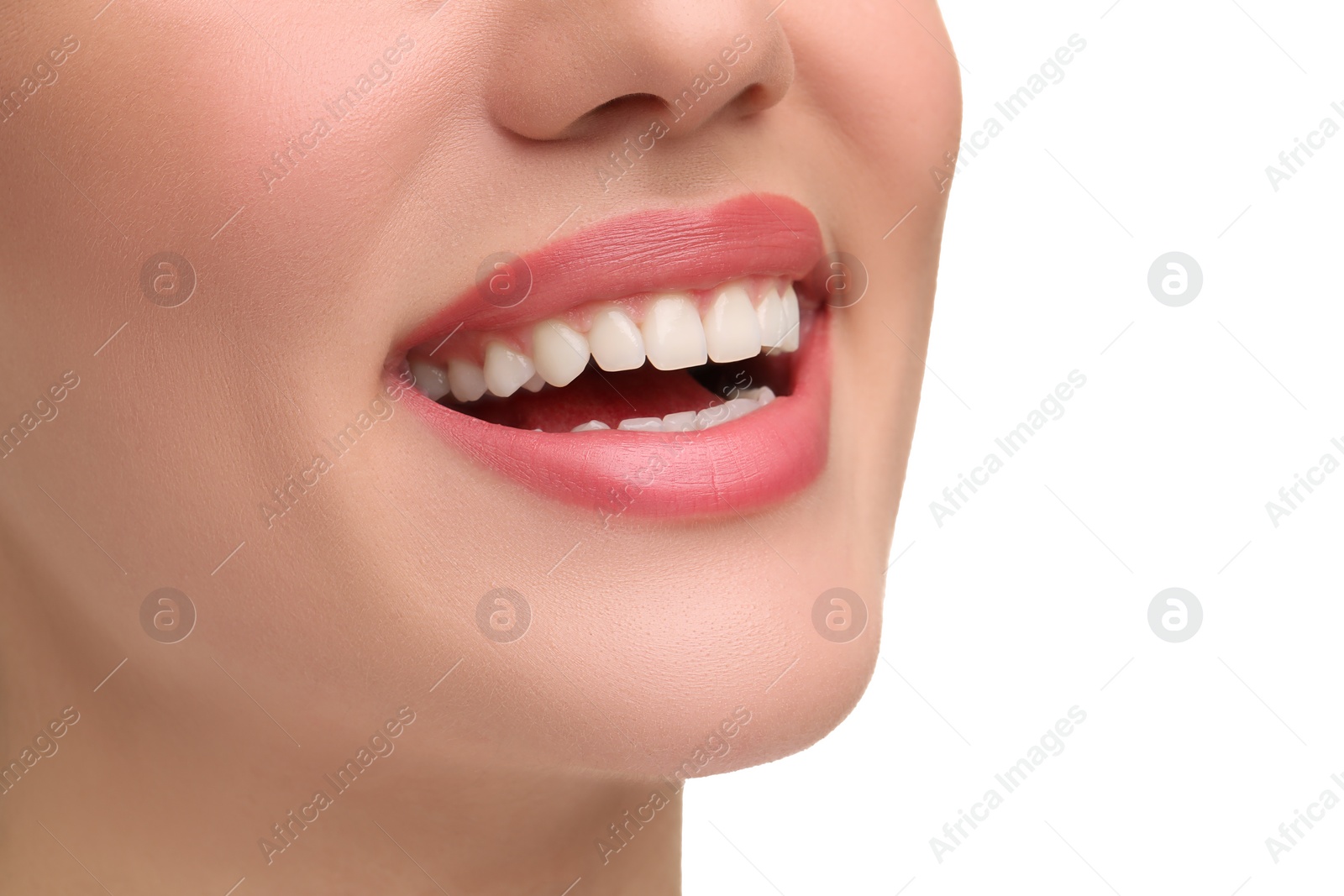 Photo of Woman with clean teeth smiling on white background, closeup