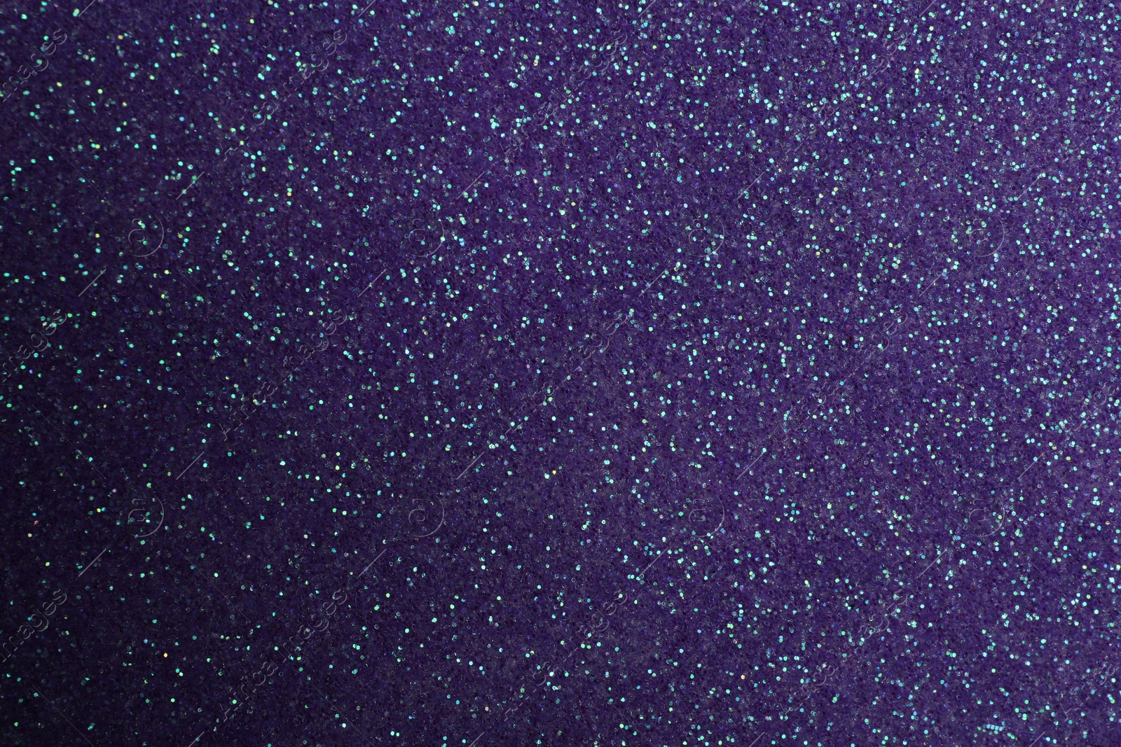 Photo of Beautiful shiny violet glitter as background, closeup