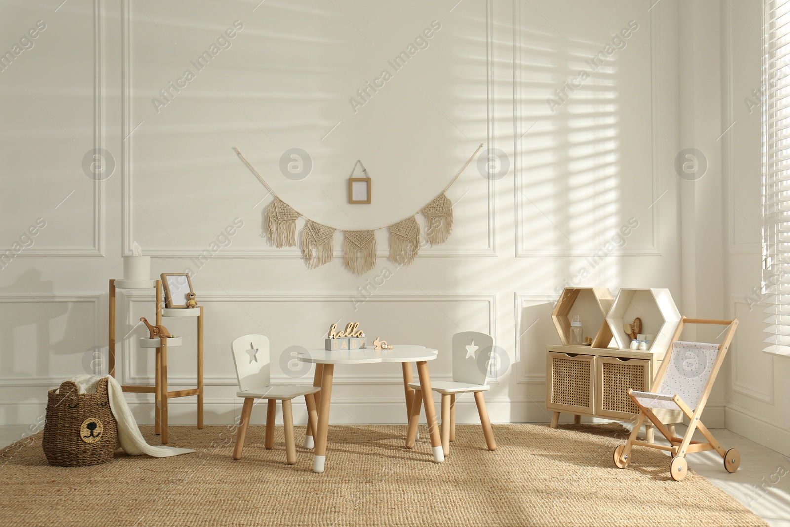 Photo of Modern child room interior with stylish furniture and accessories