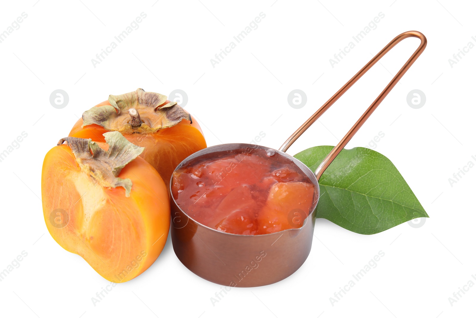 Photo of Saucepan of tasty persimmon jam and fresh fruits on white background